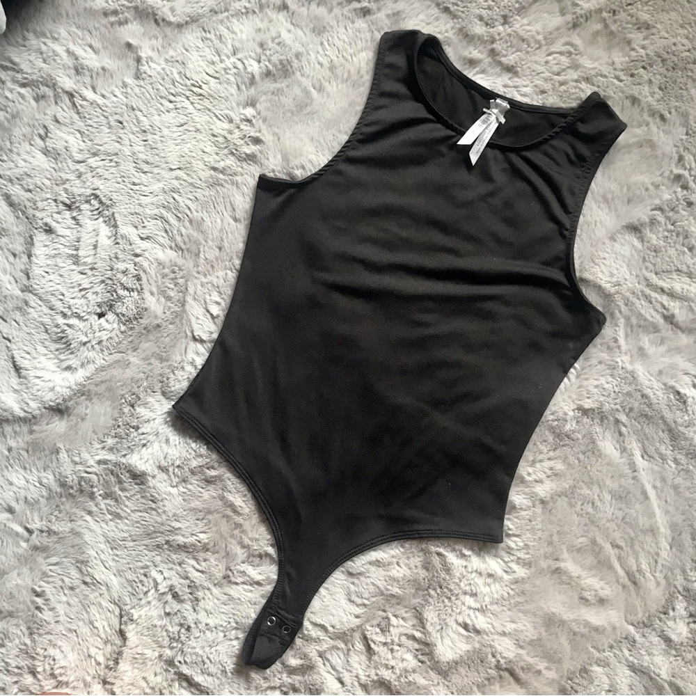 FREE with Purchase: Worn once black thong high neck bodysuit black small